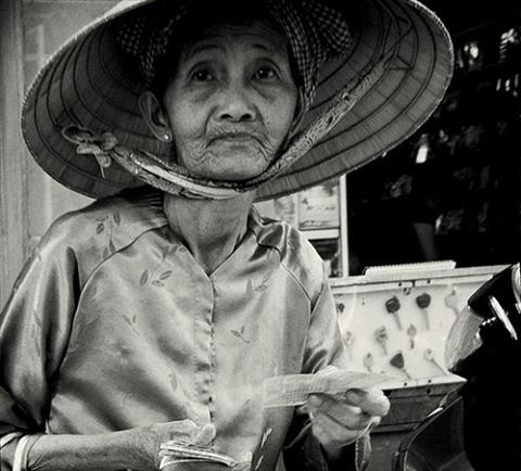 Người đàn bà bán vs số yêu nghề hình ảnh Nguoi dan ba ban vs so yeu nghe hinh anh